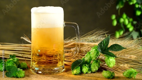 pouring beer into a glass, professional lighting photo