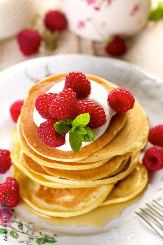 Pancakes with fresh raspberries and cream cheese
