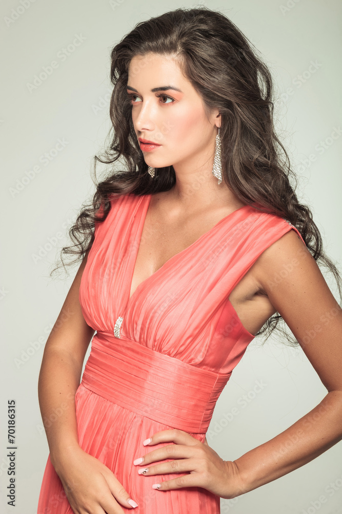 side view of an elegant woman in red dress side view of an elegant woman in red dress
