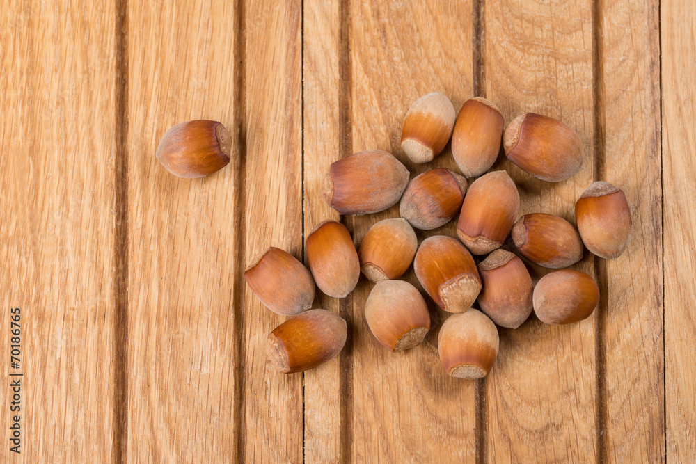 Whole nuts hazelnut on wooden background Whole nuts hazelnut on wooden background