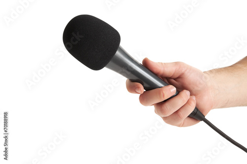 Person hand holding microphone