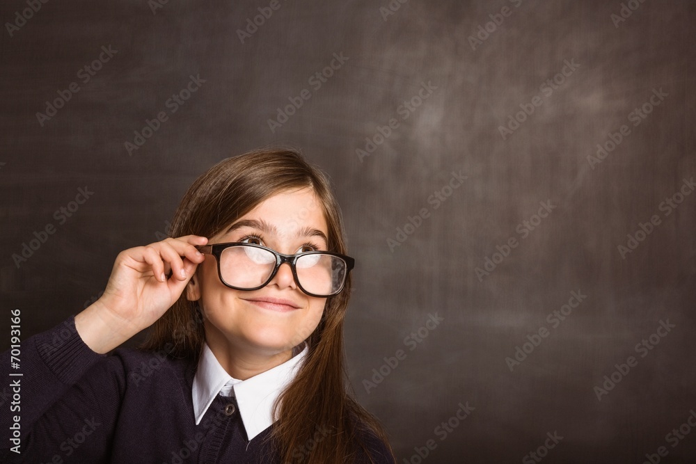 Cute pupil smiling and looking up Cute pupil smiling and looking up