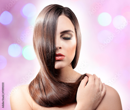 Beautiful young woman with ...
