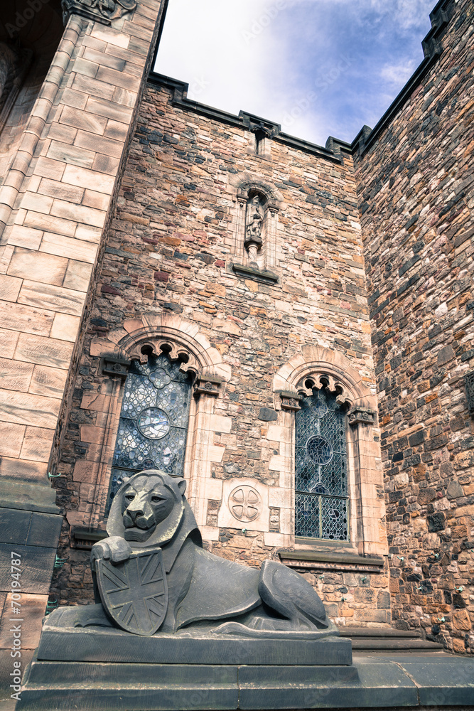 Wide viewof stone lion in Edinburgh castle, closeup