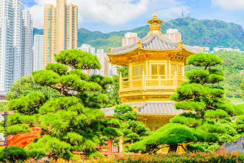 Gold Chinese pavilion at the park of Hong Kong