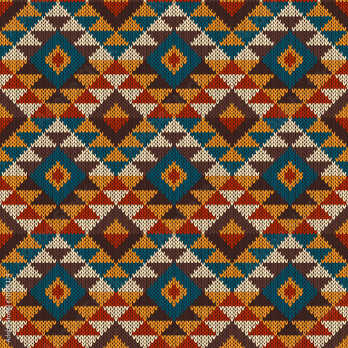 Traditional Tribal Aztec seamless pattern on the wool knitted te