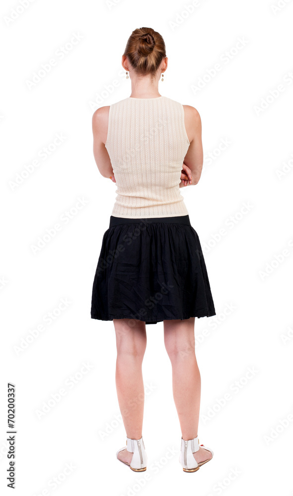 back view of standing young beautiful woman. back view of standing young beautiful woman.