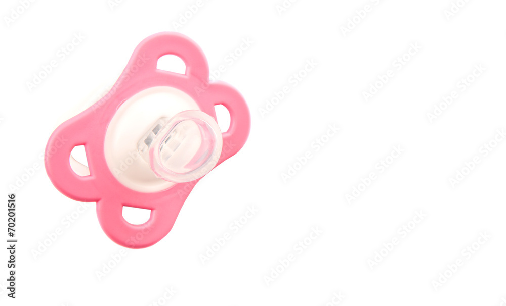 A pink pacifier over white background A pink pacifier over white background