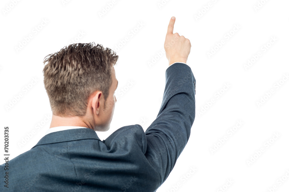 Businessman pointing copy space Businessman pointing copy space