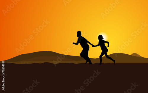 Silhouette of couple running