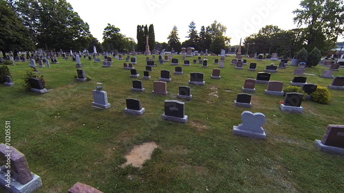 An aerial view moving above a cemetery