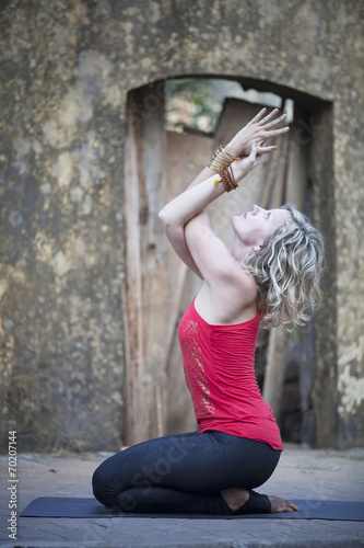 Young Woman Practicing Yoga photo