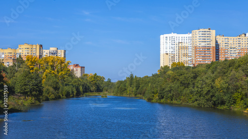 Pushkino, RussiaCity landscape. Houses on river banks photo