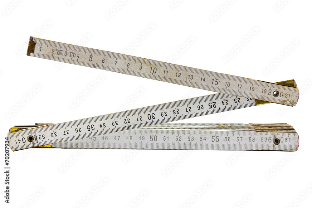 Old carpentry ruler isolated on white Old carpentry ruler isolated on white