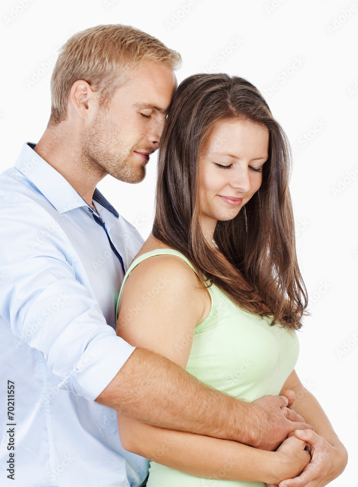 Portrait of a Happy Young Couple Embracing Portrait of a Happy Young Couple Embracing