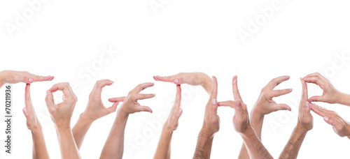 lot of hands form the word together