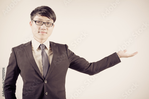 Successful young business man of Asian, full length portrait iso