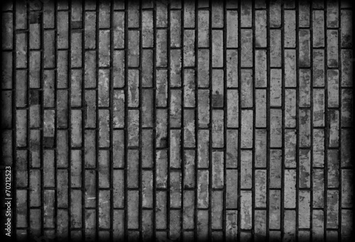 Background of dark black brickwall texture.