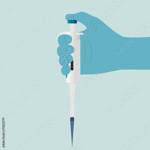 hand with pipette