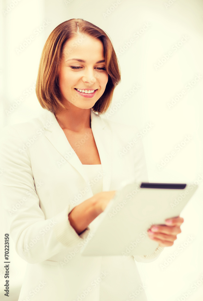 businesswoman with tablet pc in office businesswoman with tablet pc in office