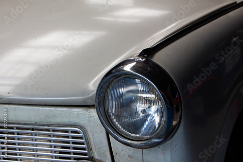 Fragment of white old car close up © wlad074