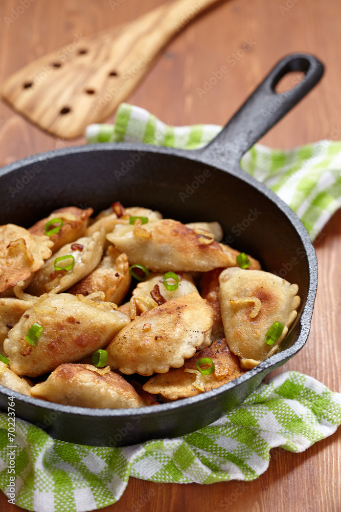 Dumplings fried with onion Dumplings fried with onion