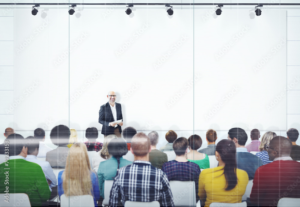 Obraz premium People Listening to the Speaker's Presentation