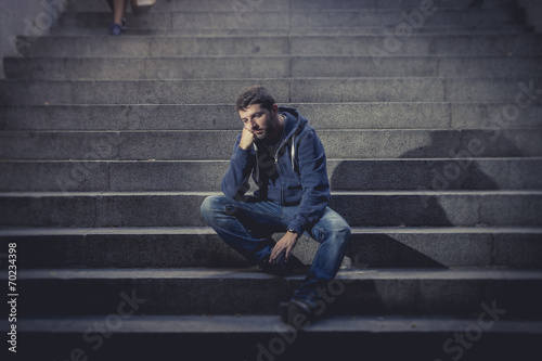 Young drug addict man wasted homeless in depression