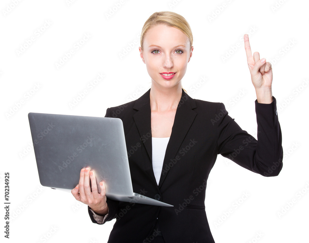Caucasian businesswoman with laptop and finegr point up Caucasian businesswoman with laptop and finegr point up