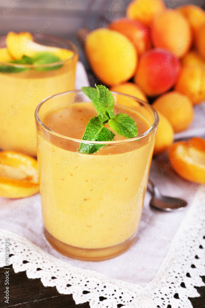 Apricot dessert in glasses on table close-up Apricot dessert in glasses on table close-up