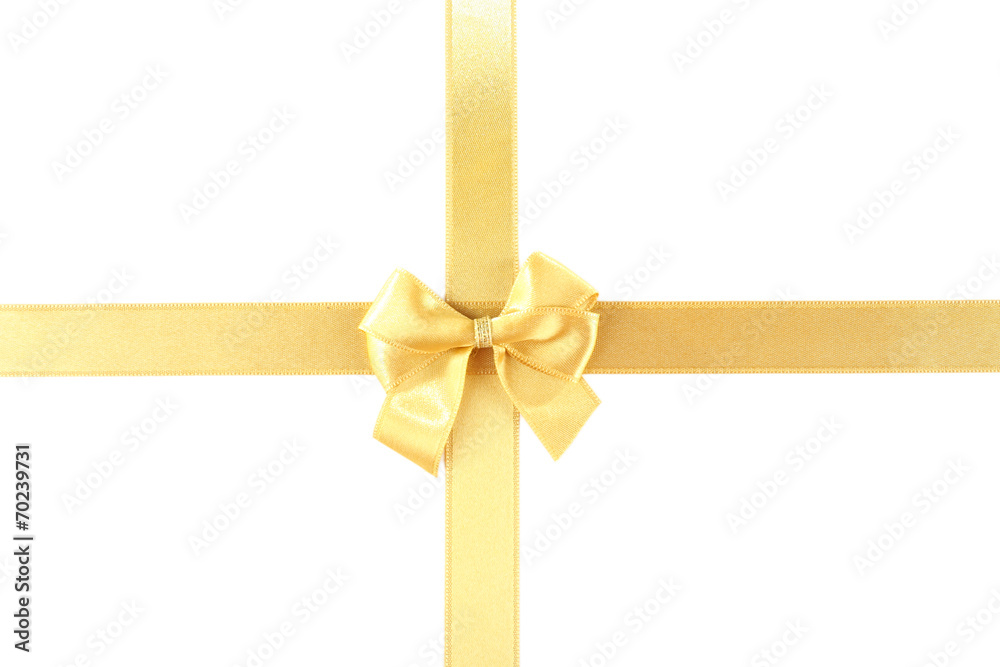 Golden ribbon and bow isolated on white Golden ribbon and bow isolated on white