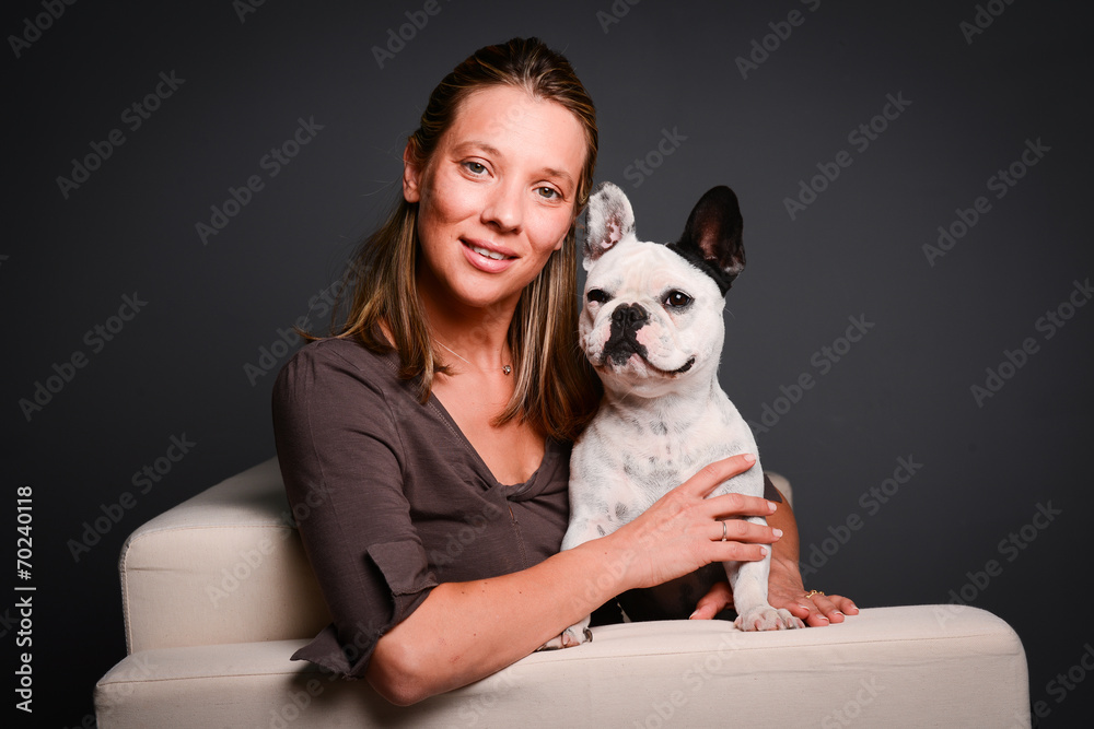 isolated studio shot of young woman with pet french bulldog isolated studio shot of young woman with pet french bulldog