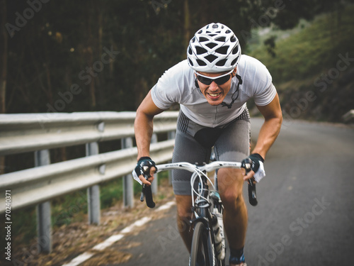 Cyclist in maximum effort photo