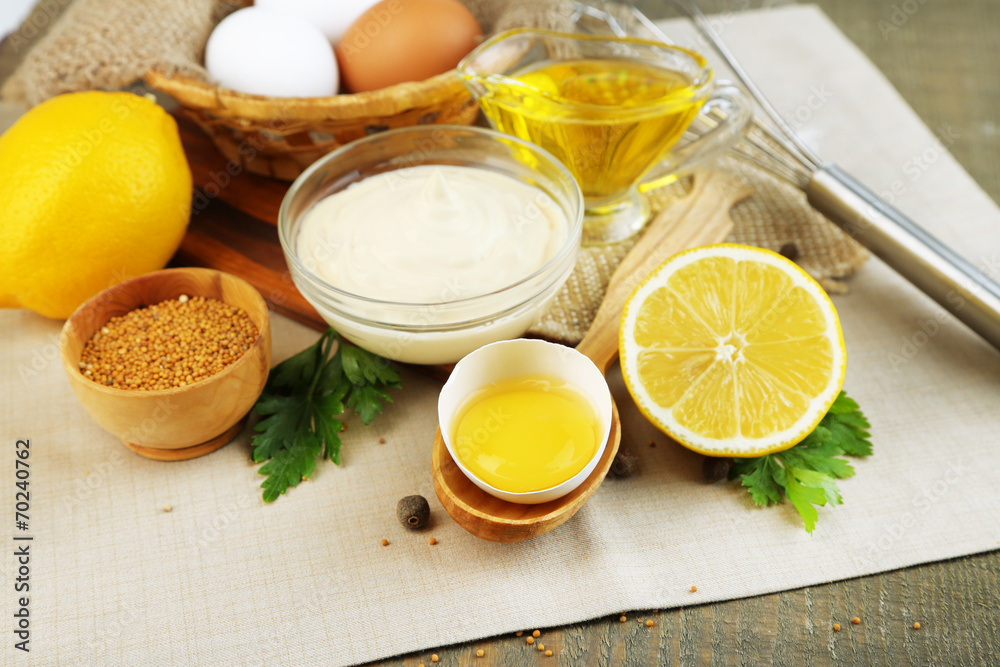Mayonnaise ingredients on wooden background Mayonnaise ingredients on wooden background