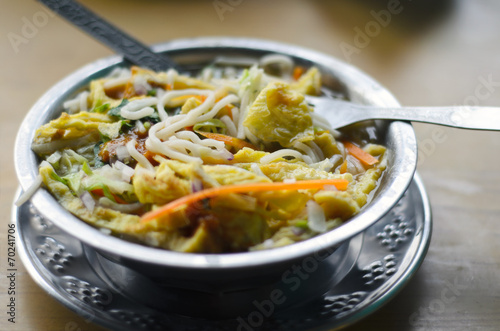Traditional Tibetan soup thukpa in metal bowl