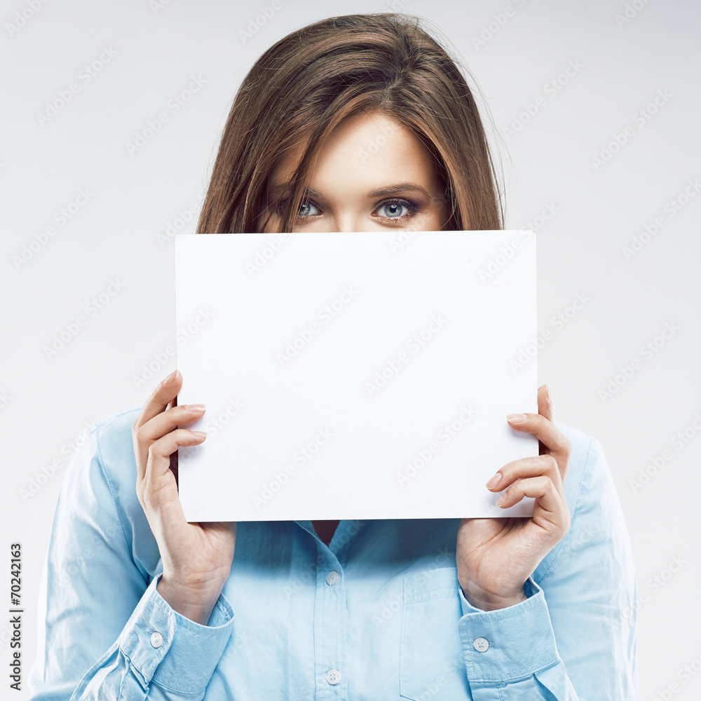 Young office worker woman hiding face behind banner. Young office worker woman hiding face behind banner.