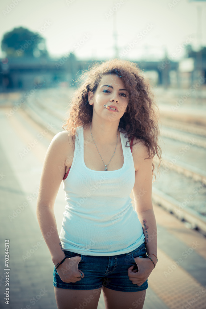 young beautiful long curly hair hipster woman