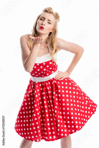 Pin up Girl gibt einen Luftkuss photo