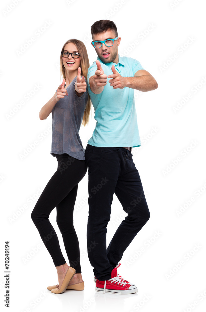 Happy couple smiling holding thumb up gesture, beautiful young m Happy couple smiling holding thumb up gesture, beautiful young m