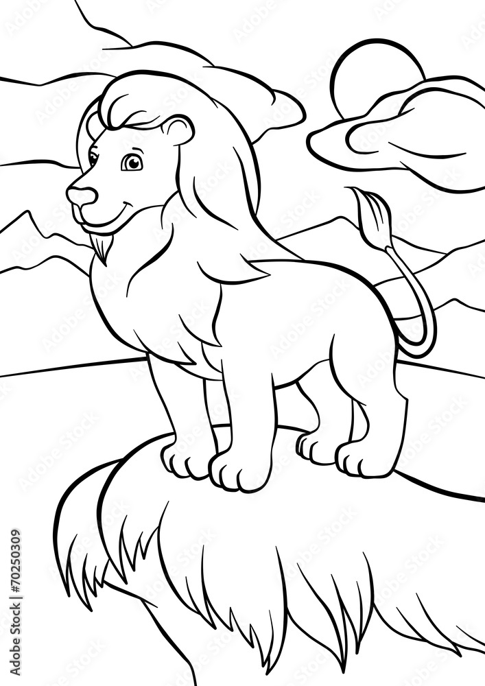 Obraz premium Lion stands on the rock