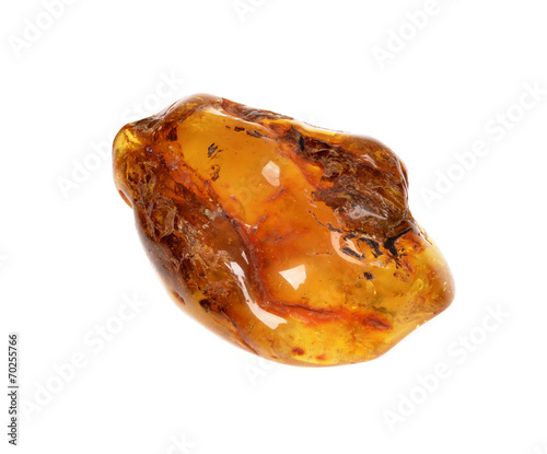 piece of baltic amber isolated on white background
