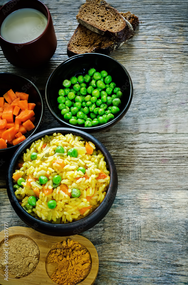 Indian vegetarian pilaf, Biriyani, with carrots and green peas Indian vegetarian pilaf, Biriyani, with carrots and green peas