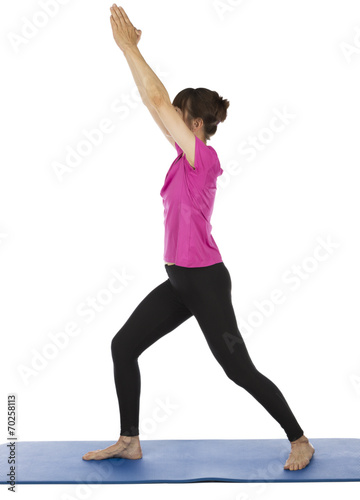 Active senior woman doing pilates