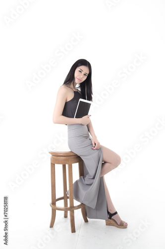 Tablet computer woman on white background © 131pixfoto
