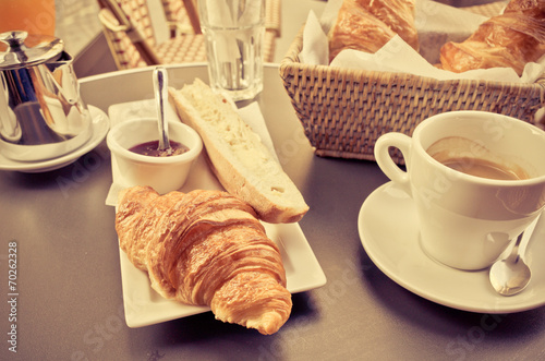 coffee and croissants on table