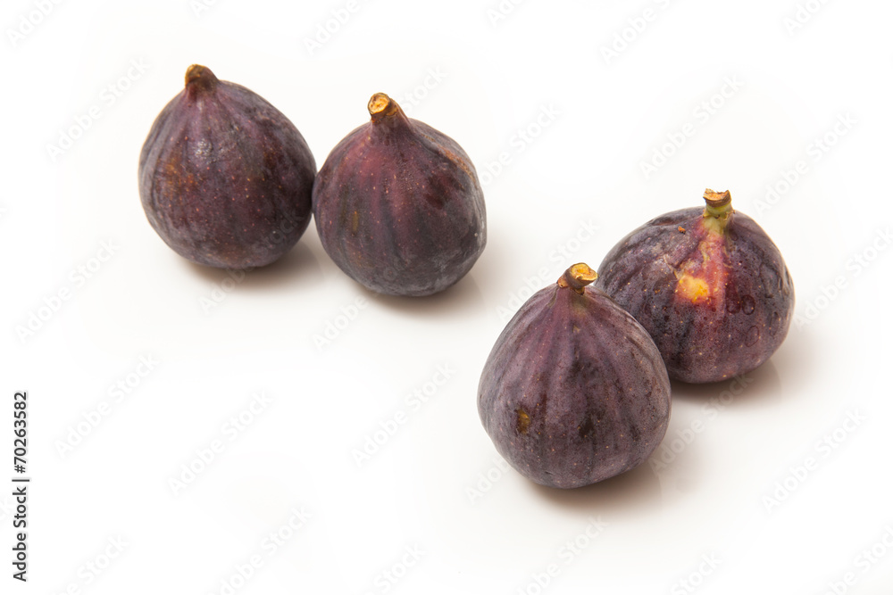 Fresh turkish figs isolated on a white studio background. Fresh turkish figs isolated on a white studio background.