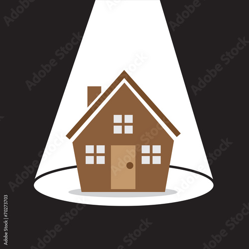 Spotlight shining directly on house