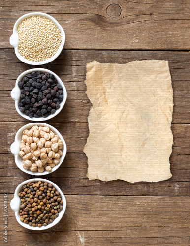 Cereals and legumes in bowls photo