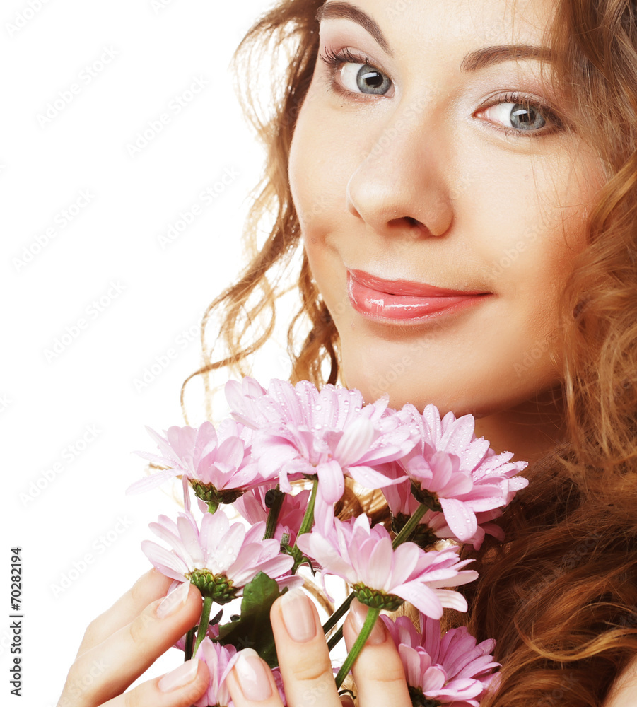 blond girl with pink flower on white background