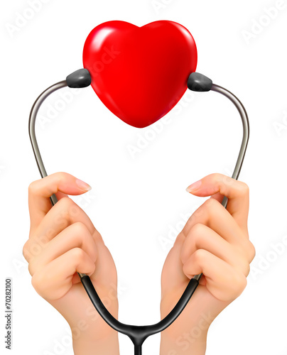 Medical background with hands holding a stethoscope with red hea